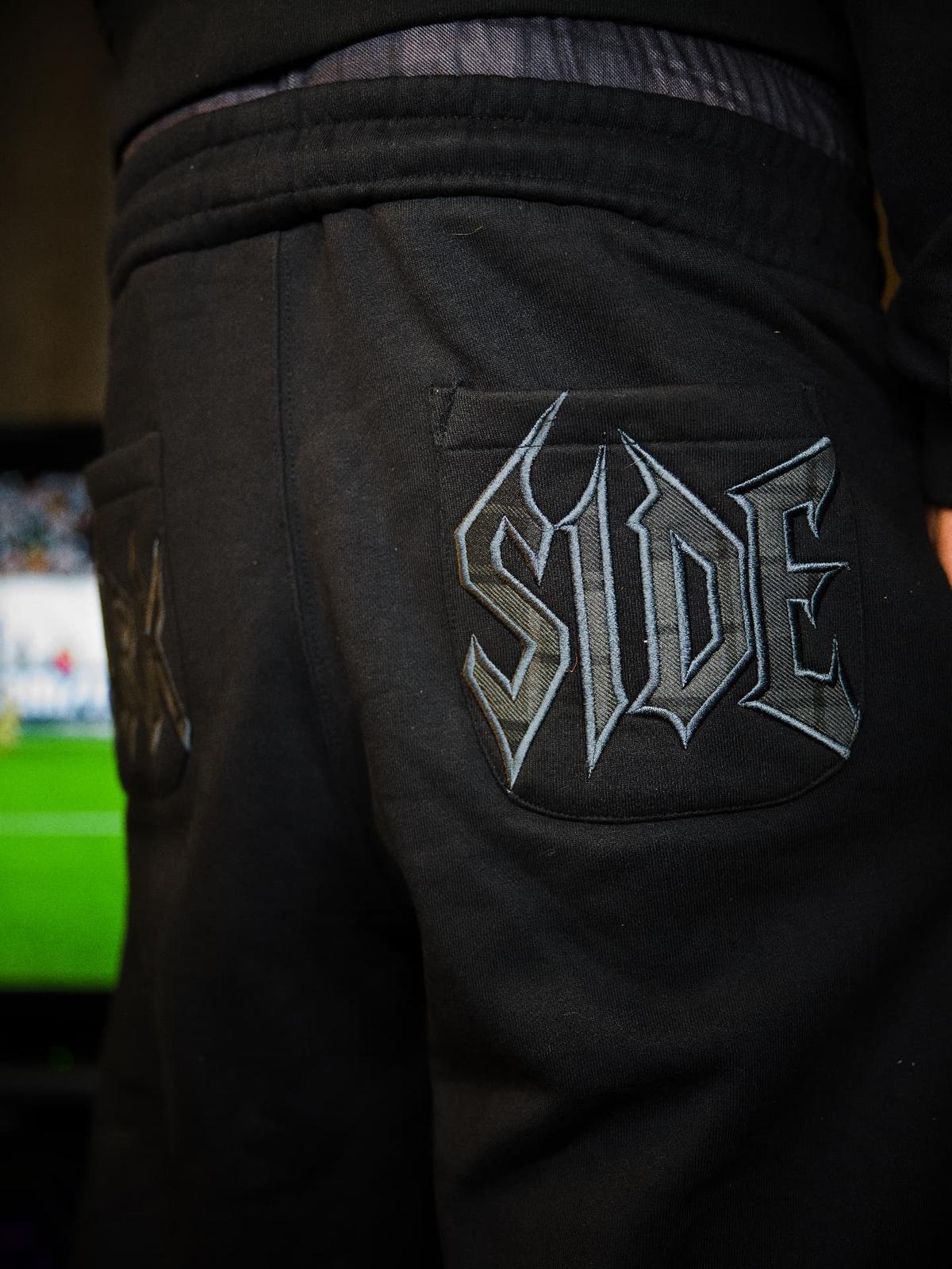 Parkside black joggers — embroidered rear pocket close-up